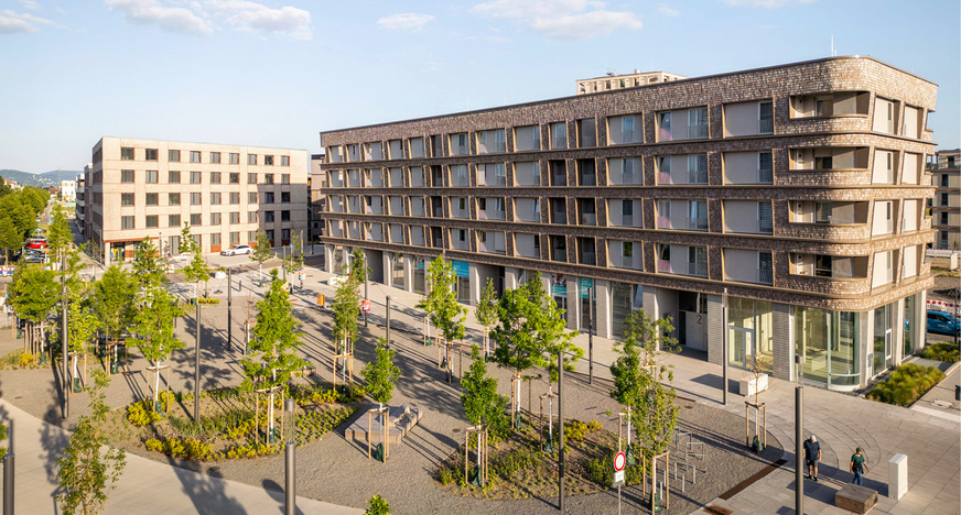 10 Im Wohn- und Geschäftshaus Bumerang ist die Erdgeschosszone für gewerbliche Nutzung vorgesehen.
