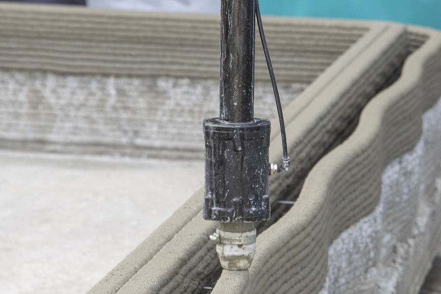 Auch geschwungene Wandelemente lassen sich mit dem 3D-Druckverfahren präzise und effizient realisieren.