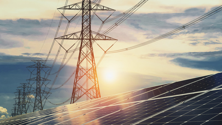 Solar panels with electricity pylon and sunset. Clean energy concept. power alternative