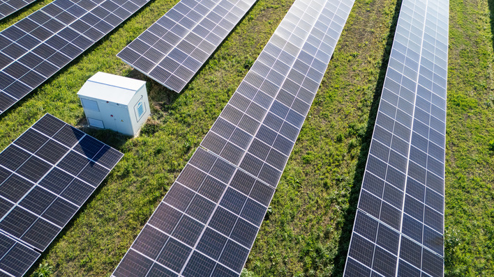 Aerial view of solar power station with energy storage.