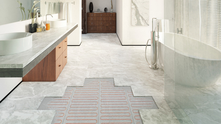 Heizmatten erlauben einen sehr flachen Aufbau der Fußbodenheizung im Bad.